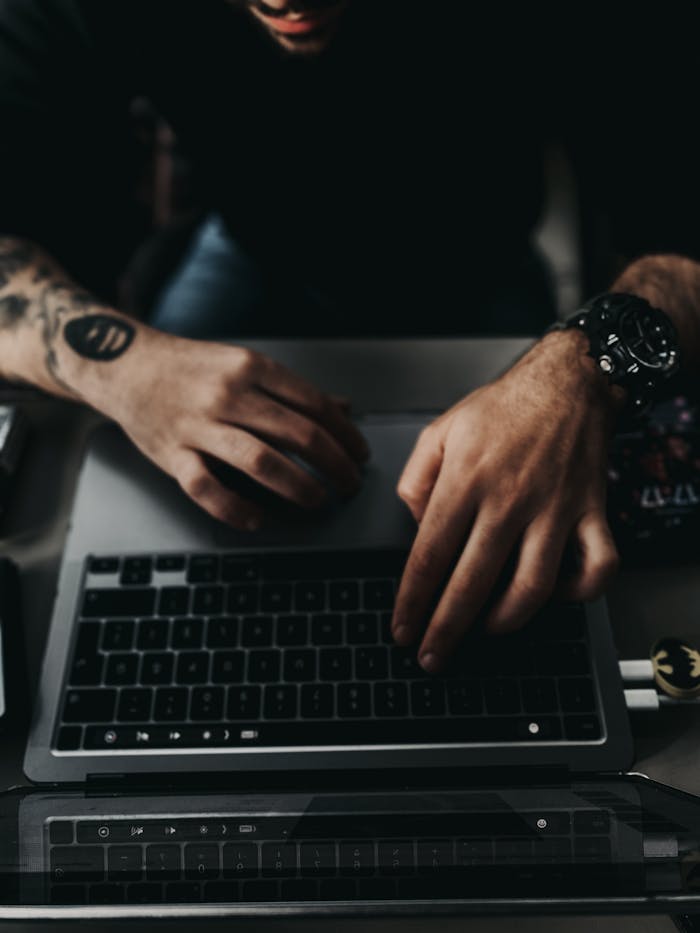 Man Hands on Laptop